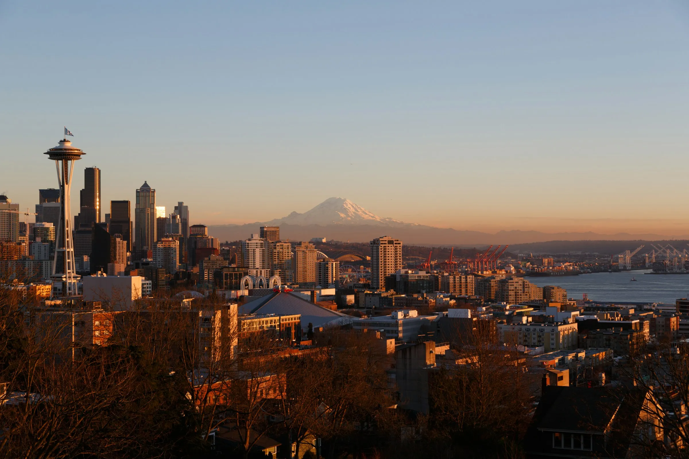 Seattle skyline at golden hour with Mount Rainier